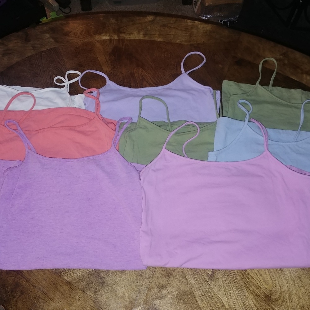 8 Cami tank tops. Variety of colors, size medium